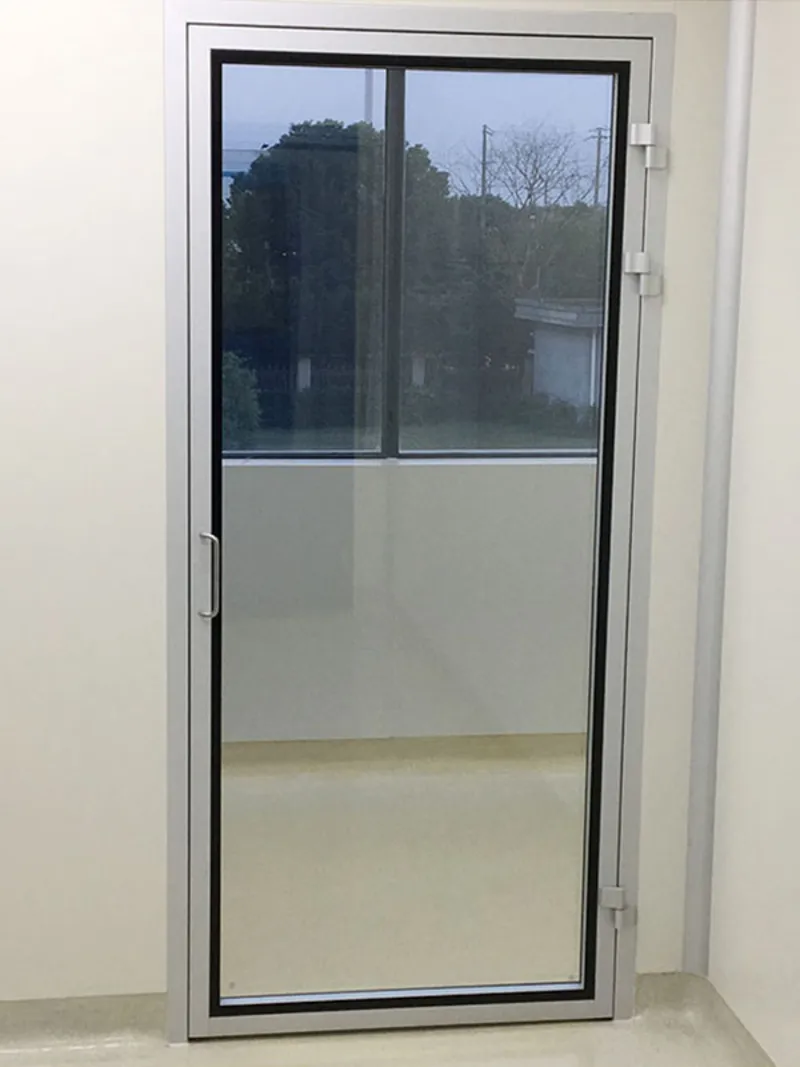 Clean room glass door integrated with full glass partition wall in biomedical lab
