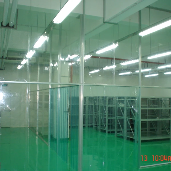 Clean Panel Clean Booth installed beside production line with technician accessing interior through sliding door